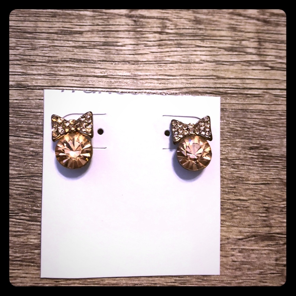 Rose gold diamond earrings with bows